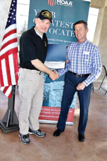 Colonel Nagy presents Certificate of Appreciation and MOAA Challenge Coin to Command Sergeant Major Belanger.