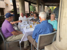 Residents enjoying a Dine Around dinner on the patio at Tavolino Ristorante Italiano.