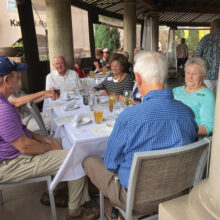 Residents enjoying a Dine Around dinner on the patio at Tavolino Ristorante Italiano.