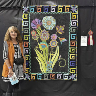 Tami Graeber won second place with herquilt "Greek Garden Party."